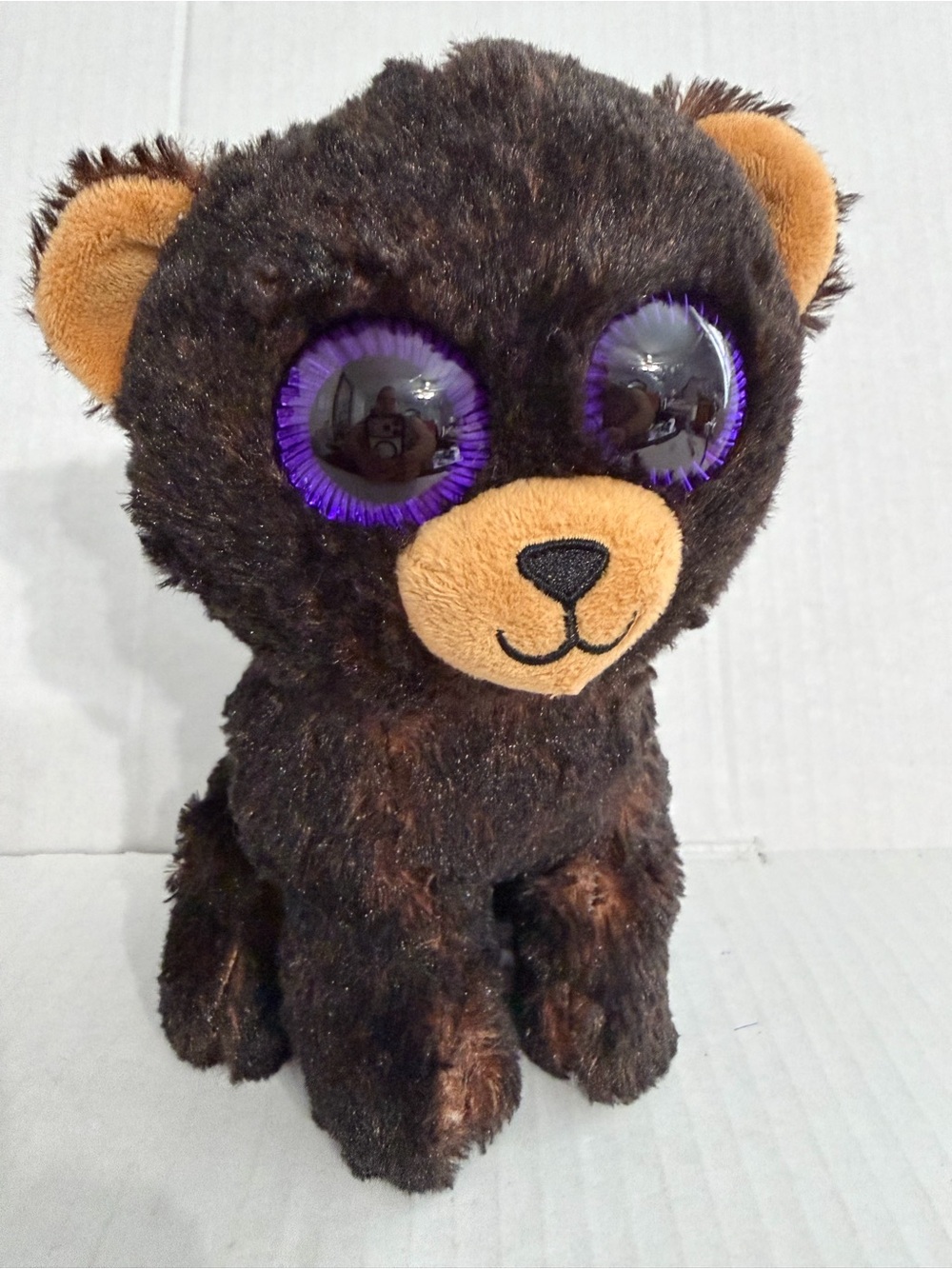 US Fun Machines Cuddly Dark Brown Plush Bear with Purple Eyes